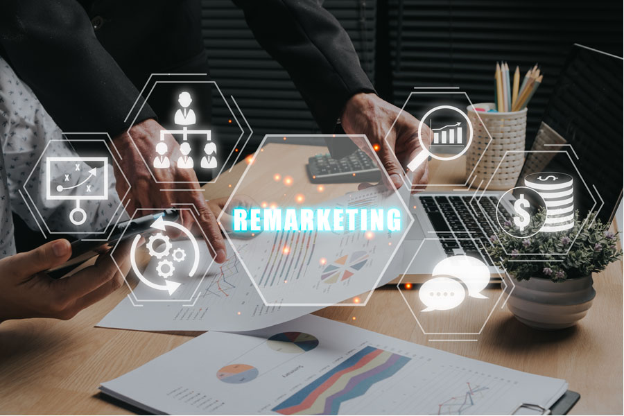 Remarketing concept, Business team analyzing income charts and graphs on office desk with remarketing icon on virtual screen.